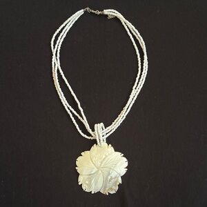 Elegant White Beaded Necklace with Floral Pendant
